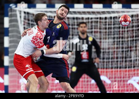 Arkadiusz Ossowski (Polen) und Nicolas Tournat (Frankreich) anlässlich des EHF Euro 2024 für Männer, Qualifikationsspiele zwischen Polen und Frankreich am 8. März 2023 in der ERGO Arena in Danzig (Polen) – Foto: Piotr Matusewicz/DPPI/LiveMedia Stockfoto