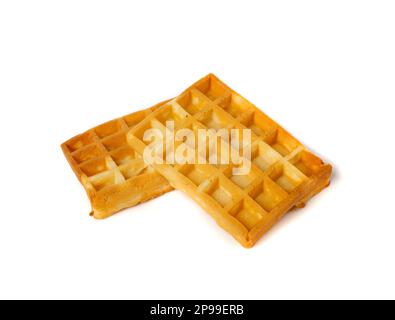 Belgische Waffel isoliert, quadratische Waffel, weiche goldene belgische Waffeln, Wafer Biscuit Frühstück auf weißem Hintergrund Stockfoto