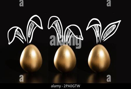 Frohe Ostern, Kaninchenohren, goldene Eier. Stockfoto