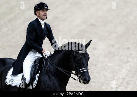 DEN BOSCH - Hans Peter Minderhoud (NED) auf Glocks Dream Boy in Aktion im Dressage kur zur Musik während der Dutch Masters Indoor Brabant Horse Show. AP-SCHLEIFGERÄT KING Stockfoto