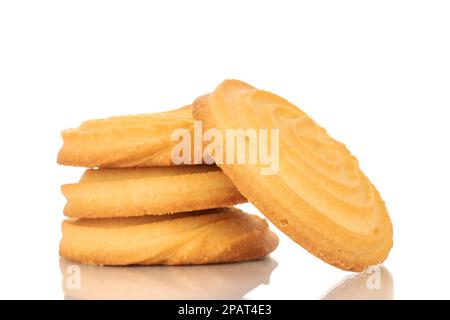 Vier süße Kekse mit Butter, Makro, isoliert auf weißem Hintergrund. Stockfoto