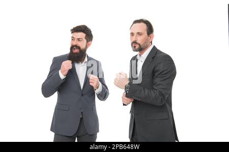 Gute Laune und unbeschwert. Bildung für Unternehmen. Erfolgreiches Unternehmertum. Partnerschaftsprojekt. Geschäftsteam. Bärtige Geschäftsleute in formeller Form Stockfoto