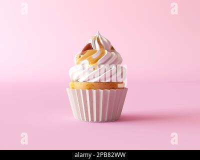 Vanille Cupcake mit Buttercreme-Glasur isoliert auf hellrosa Hintergrund. Frosted Cupcakes mit weißer Sahne und Karamellsauce, Nüsse. Stockfoto