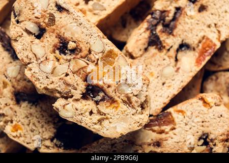 Leckere Biscotti-Kekse als Hintergrund, Nahaufnahme Stockfoto