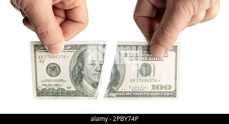 Handgehaltene zerrissene Dollarbanknote isoliert auf weißem Hintergrund Stockfoto
