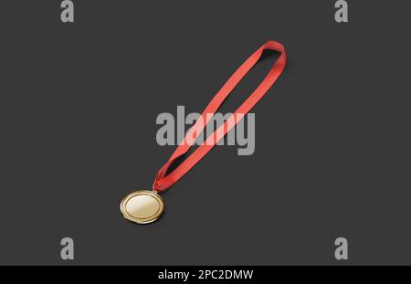 Goldmedaille mit rotem Schleifenmuster, dunkler Hintergrund Stockfoto