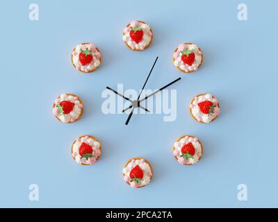 Kreatives Konzept Zeit zum Nachtisch. Kleine Kuchen mit Baiser, rund, in Form einer Uhr, süße Zeitidee. Isoliert auf Pastellblau Stockfoto