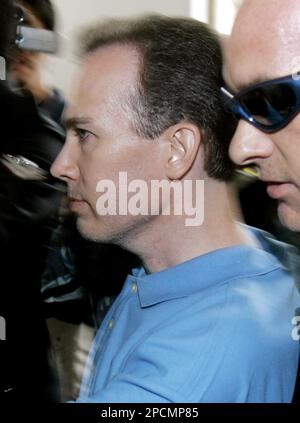 An American suspect John Mark Karr arrives at Bangkok Internationnal