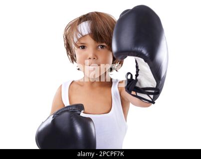 Dynamit ist in kleinen Packungen erhältlich. Porträt eines Jungen in Boxausrüstung. Stockfoto