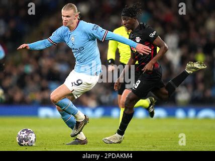 Erling Haaland (links) von Manchester City und Amadou Haidara von Red Bull Leipzig kämpfen um den Ball während der UEFA Champions League-Runde mit 16 2. Spielbeinen im Etihad Stadium, Manchester. Foto: Dienstag, 14. März 2023. Stockfoto