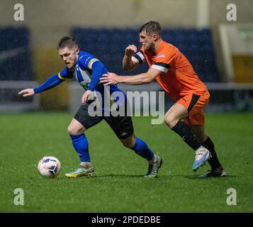 Chester, Cheshire, England. 14. März 2023 Chester Captain Declan Weeks hält den Ball hoch, während des Chester Football Club V Peterborough Sports Football Club im Deva Stadium, in der National League North (Bild: ©Cody Froggatt/Alamy Live News) Stockfoto