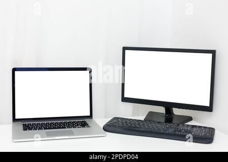 Laptops, Tablets und Mobiltelefone. Modellbild von elektronischen Geräten, isoliert auf weißem Hintergrund Stockfoto