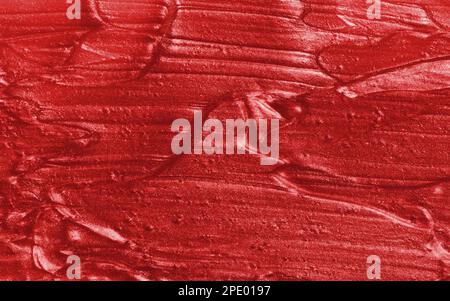 Probe von rotem Glitzergel mit kleinen Partikeln, Textur von Textmarkern, Lippenstift, Rouge Stockfoto