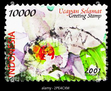 MOSKAU, RUSSLAND - 17. FEBRUAR 2023: Poststempel gedruckt in Indonesien zeigt Cattleya, Blumenserie, ca. 2001 Stockfoto