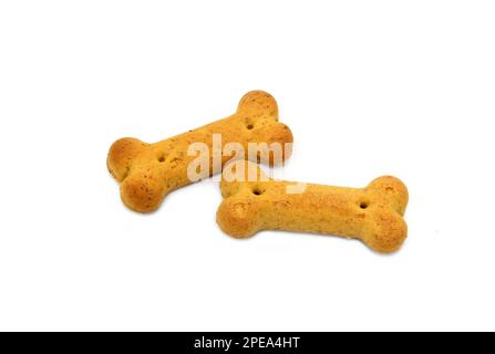 Knochenkekse für Hunde auf weißem Hintergrund. Hundekekse in weiß isoliert. Stockfoto