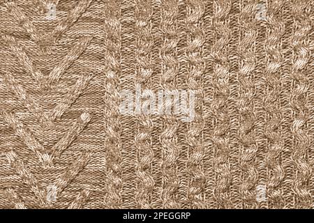 Strickstruktur aus natürlichem, weichem Wollgestrickmaterial Braun Melange als Hintergrund Stockfoto