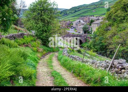 Muker ist ein Dorf und eine zivile Gemeinde am westlichen Ende von Swaledale in North Yorkshire, England, im Bezirk Richmondshire. Stockfoto