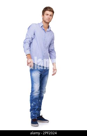 Er ist ein stilvoller junger Mann. Das ganze Porträt eines gutaussehenden jungen Mannes. Stockfoto
