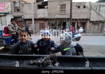 Uiguren in der Altstadt in Kashgar, Xinjiang, China. Stockfoto