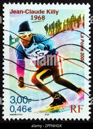 RANCE - CIRCA 2000: Ein in Frankreich gedruckter Stempel zeigt Jean-Claude Killy (olympischer Goldmedaillengewinner bergab, Riesen- und Spezialslalom, 1968), ca. 2000. Stockfoto