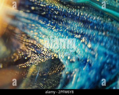 Makroaufnahme aus mehrfarbigem mundgeblasenem Glas Stockfoto