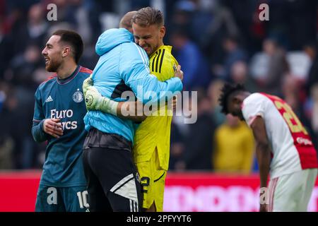19-03-2023: Sport: Ajax gegen Feyenoord AMSTERDAM, NIEDERLANDE - MÄRZ 19: Torwart Timon Wellenreuther (Feyenoord Rotterdam) und Orkun Kokcu (Feyenoo Stockfoto