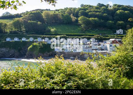 Chalets am Strand in Hele Bay, Ilfracombe, North Devon, Großbritannien Stockfoto