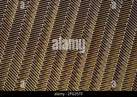 Abstrakter metallischer Hintergrund mit Schlitzen, Detail für nukleare Brennstoffkartusche Stockfoto