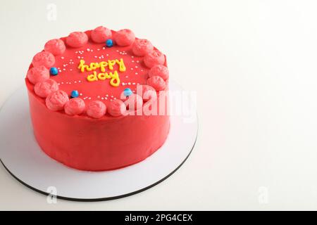 Süßer Bento-Kuchen mit leckerer Creme auf weißem Hintergrund Stockfoto