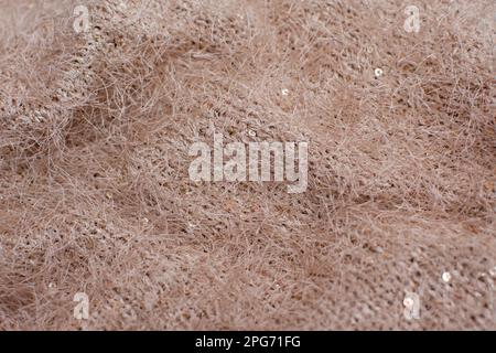 Flauschige Strickmaterialien aus Wolle. Texturhintergrund. Stockfoto