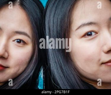 Eine Nahaufnahme chinesischer Zwillingsschwestern. Stockfoto