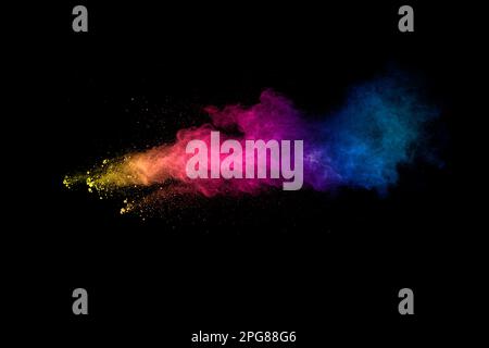 Abstrakte Multi Color Pulver Explosion auf schwarzen Hintergrund. Freeze Motion von bunten Staubpartikel Splash. Malte Holi. Stockfoto