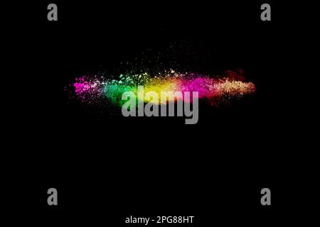Abstrakte Multi Color Pulver Explosion auf schwarzen Hintergrund. Freeze Motion von bunten Staubpartikel Splash. Malte Holi. Stockfoto