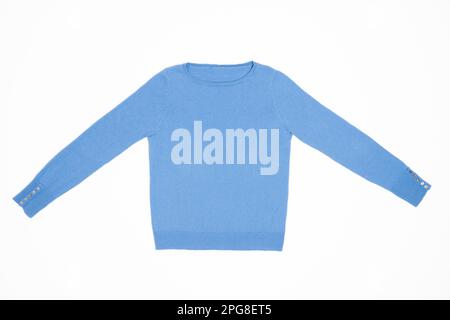 Stillleben. Im Studio wurde ein flacher, blauer Pullover mit Manschettenknöpfen aufgenommen Stockfoto