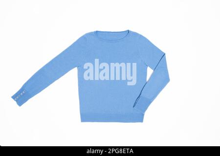 Stillleben. Im Studio wurde ein flacher, blauer Pullover mit Manschettenknöpfen aufgenommen Stockfoto