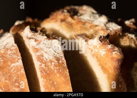 Makro-Nahaufnahme eines Brotstücks Stockfoto