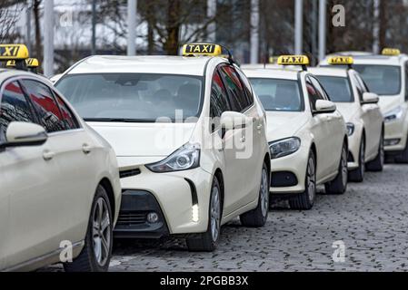 Many taxis queue up, waiting in line at the taxi stand, Messe, Munich, Upper Bavaria, Bavaria, Germany Stock Photo