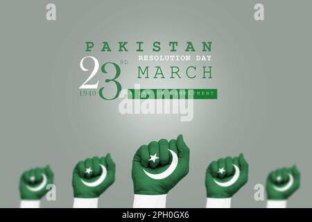 Pakistan Resolution Day 23. märz 1940 Poster mit Händen mit pakistanischer Flagge und grauem Hintergrund Stockfoto