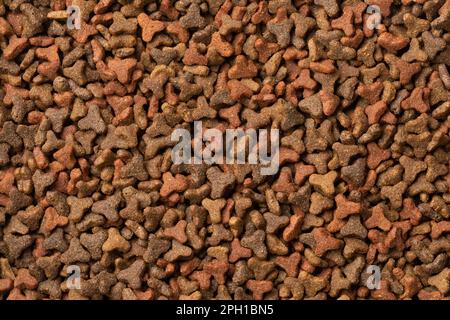 Trockenes Katzenfutter Nahaufnahme Vollformat als Hintergrund Stockfoto