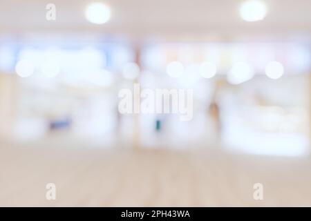 Abstrakt verwischen Sie den Innenraum des Flughafens für einen Hintergrund mit viel Platz Stockfoto