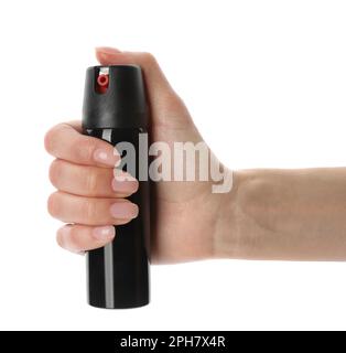 Frau mit einer Flasche Pfefferspray auf weißem Hintergrund Stockfoto