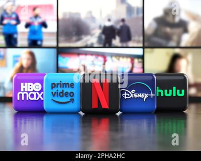 Valencia, Spanien - März 2023: App-Logos der wichtigsten Anbieter von Streaming-Filmen und TV-Serien vor Fernsehbildschirmen, Symbole in 3D-Abbildung. Netz Stockfoto