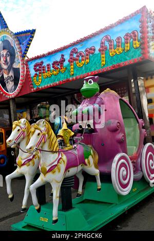 Münzbetriebene Kutschfahrt mit Mr. Kröte im Barry Island Pleasure Park, Großbritannien Stockfoto