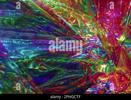 Psychedelischer Zellophan-Hintergrund mit dunklen und hellen Farben Stockfoto
