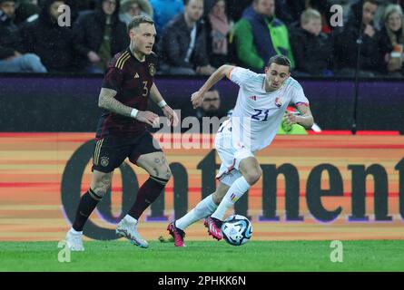 Köln, Deutschland. 28. März 2023. firo : 28. März 2023, Fußball, Fußball: DFB-Nationalmannschaft, Männer-Landspiel, Mode, GER, Deutschland - Bel, Belgien 2: 3 David RAUM, GER, Left versus CASTAGNE/dpa/Alamy Live News Stockfoto