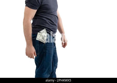 Nicht erkennbarer Mann mit Dollars in der Jeanstasche. Isoliert auf weißem Hintergrund. Stockfoto