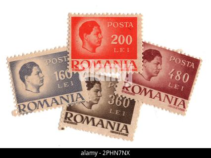 Alte Briefmarken aus Rumänien, isoliert auf weißem Hintergrund. Stockfoto
