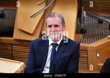 Edinburgh, Schottland, Großbritannien. 30. März 2023. IM BILD: Michael Mathieson MSP, Kabinettssekretär für NHS Recovery, Health and Social Care. Die Ernennung schottischer Minister, die vor und während der Nachmittagssitzung in der Kammer von Holyrood als neu gewählter erster Minister Schottlands gesehen wurden, Humza Yousaf MSP, ernennt verschiedene Minister. Kredit: Colin D Fisher/CDFIMAGES.COM Kredit: Colin Fisher/Alamy Live News Stockfoto