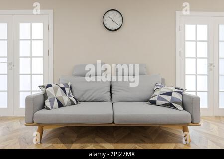 Graues Sofa im modernen Apartment-Interieur Stockfoto