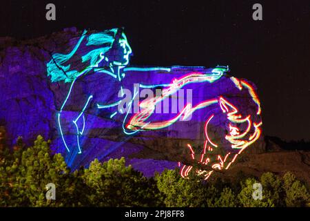 Crazy Horse Memorial Lasershow, Black Hills, South Dakota, Vereinigte Staaten von Amerika Stockfoto